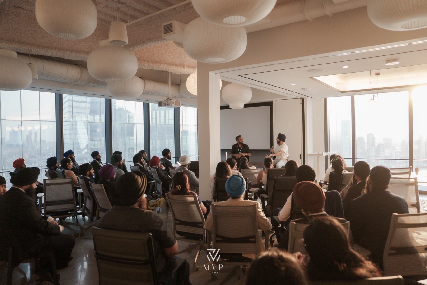 A Safal Summit session in a sunlit NYC high-rise